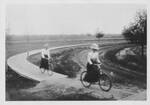 Cycling Into Town, 1899 by University of North Dakota