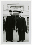 Graduates in front of Sayre Hall