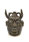 Stoneware Devil-faced Jug No. 454 by Lanier Meaders