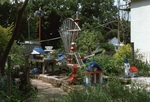 Yard Scene with Miniature City Sculpture by James Smith Pierce