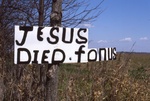 Jesus Died Sign Close Up by James Smith Pierce