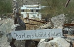 Sign "Charley's World of Lost Art" and Totem Figure by James Smith Pierce