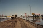 "Grand Forks Flood Evacuation. Looking N. on S. Washington" by Joan Erickson