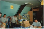 "Grand Forks Mission. Volunteers from Americare and Cridersville, OH sorting clothes - 2nd floor of Thrift Store" by Alan Draves