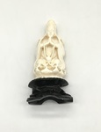 Ivory figure of Kuan Yin on a Carved Wooden Base by Maker Unknown