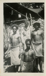 Captain Foster with Three Guadalcanal Natives