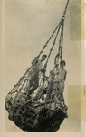 Three Soldiers in a Cargo Net