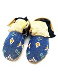 Moccasins, predominantly blue beads by Maker Unknown