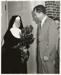 Vice-President Richard Nixon Greets a Nun, 1960 by Lee-Evanson Studio