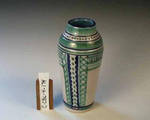 C CBL 004-0174 Side A - Light and Dark Blue Pattern on White Long Vase by Margaret Kelly Cable