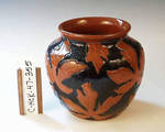 C HCK 047-0355, Red maple leaves on black vase by Flora Huckfield