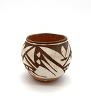 Small brown and white bowl - abstract design by Maker Unknown