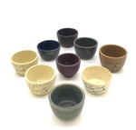 Set of 9 Glaze Test Bowls, Lot 1 - Brown, Blue and Purple by Makers Unknown