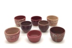 Set of 8 Glaze Test Bowls, Lot 3 - Pinks, reds, purples by Makers Unknown
