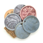 UND Sioux logo glaze test medallions - Set of 8 by Maker Unknown