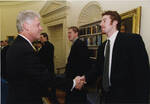 Team Member Mike Commodore with President Bill Clinton by United States. White House Photographic Office