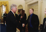 Team Captain Jason Ulmer with President Bill Clinton by United States. White House Photographic Office