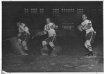 Photograph of three 1950 UND Hockey players