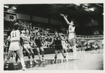 UND's Cathy Agnes (30) Takes a Jumper Versus USD by Denny Magnusson